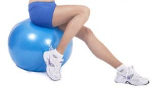 girl on exercise ball