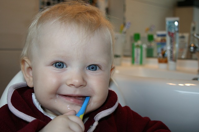 baby brushing teeth